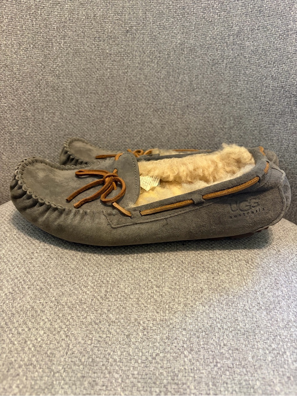 UGG- Women's size 10 Dakota Slipper in the Pewter / Charcoal Grey colorway.